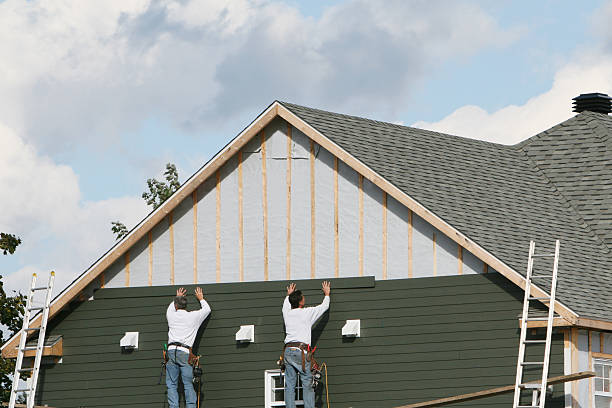 Professional Siding Installation technician working in Sayville, NY